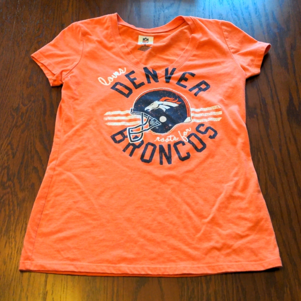 NFL Denver Broncos orange short sleeve t-shirt with broncos helmet on front